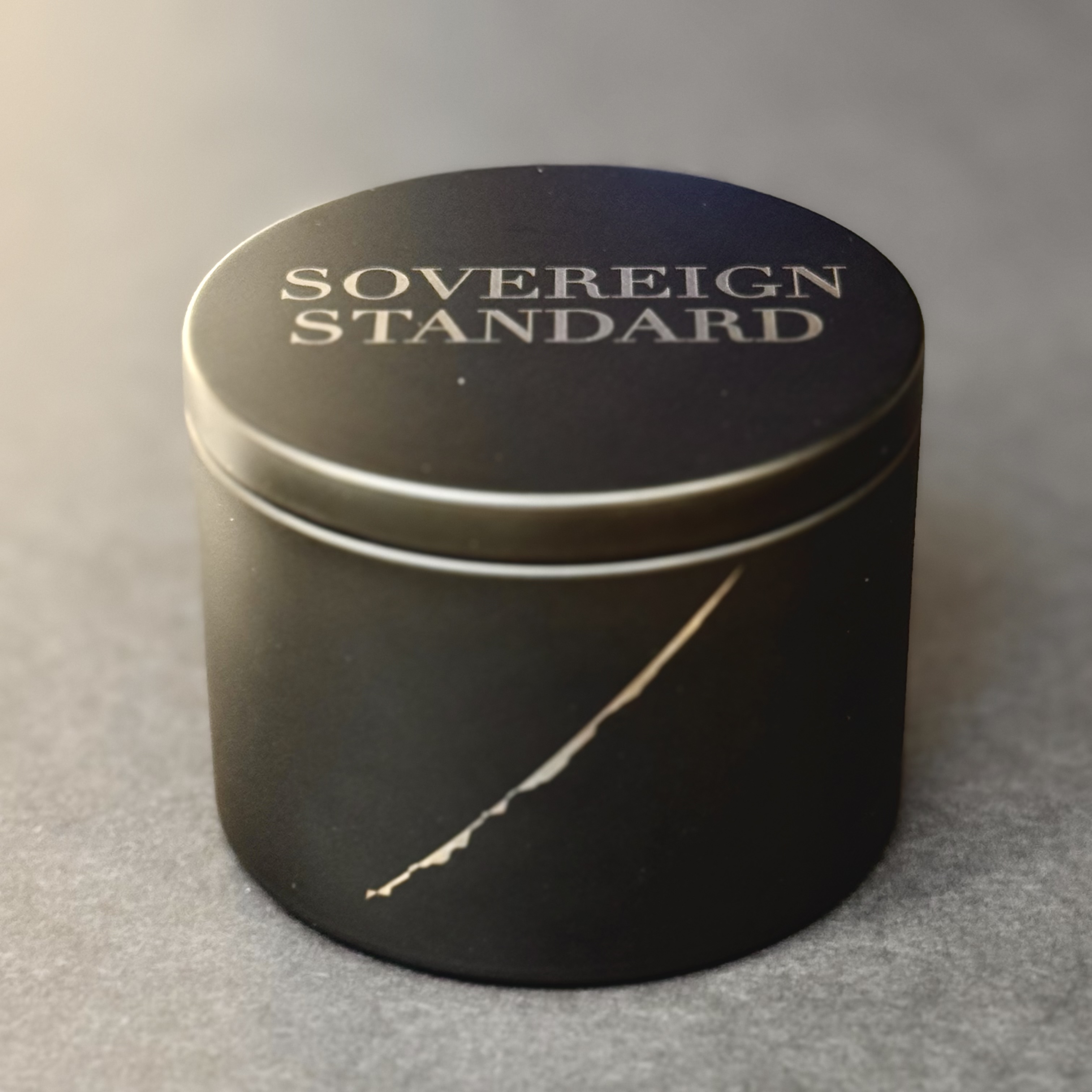 Close view of the engraved Black Tin Vessel